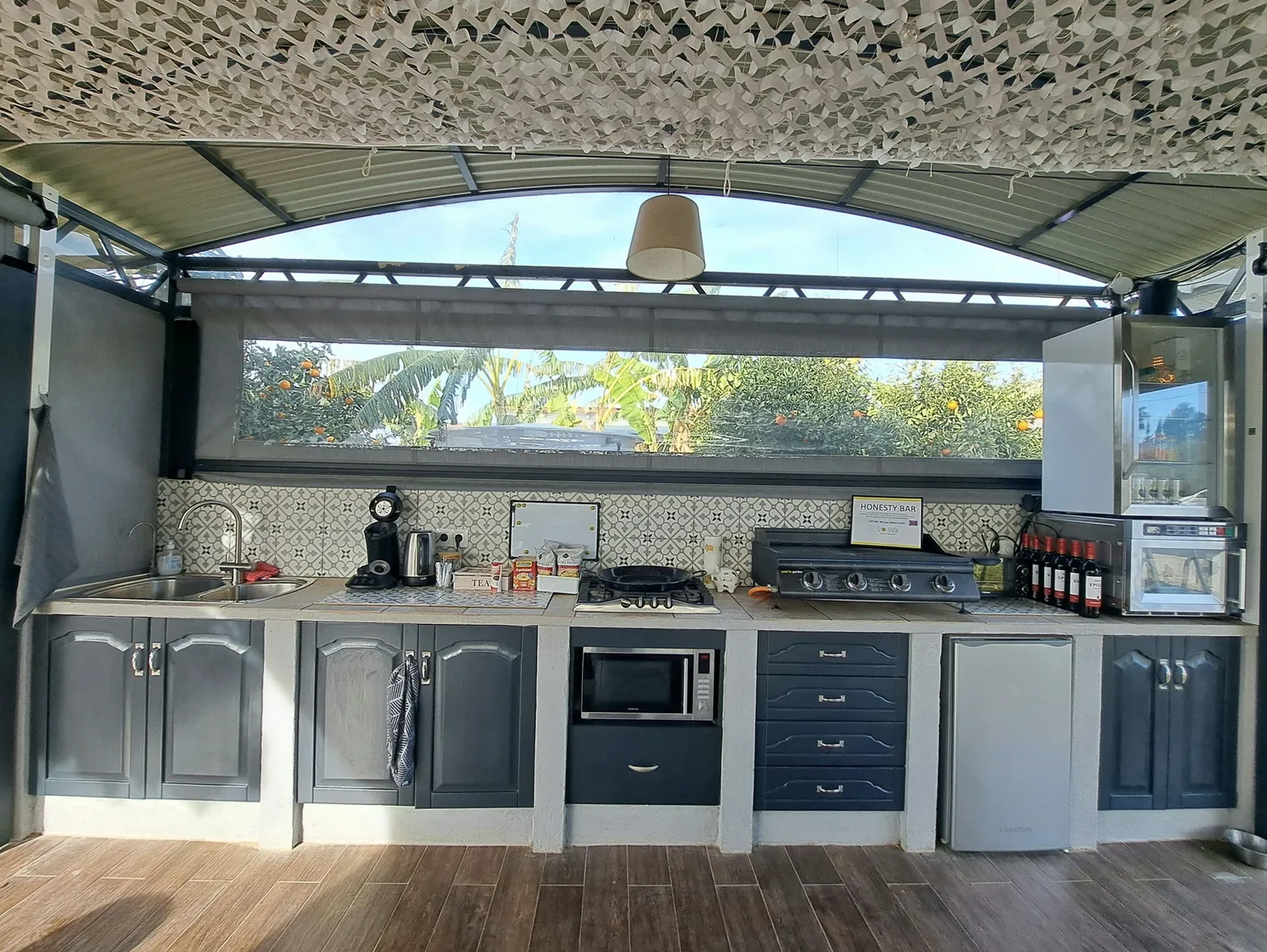 The shared outdoor kitchen