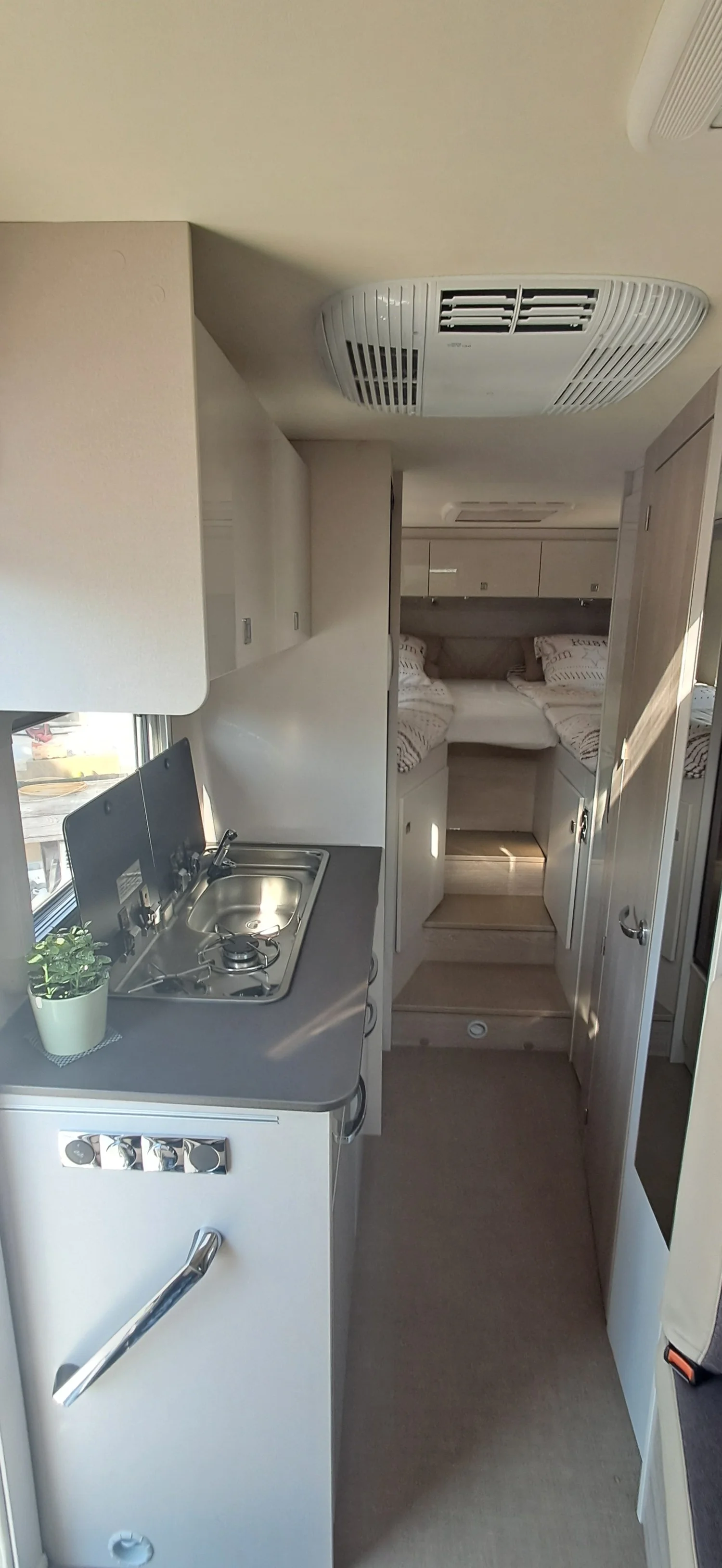 Camper Madrid kitchen and beds